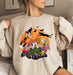 Charming sweatshirt featuring a Hocus Pocus theme, perfect for Disney loving girls.