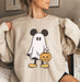 Cozy sweatshirt featuring Mickey as a friendly ghost, perfect for adding Halloween spirit.