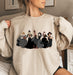 Enchanting sweatshirt with Disney Princesses dressed as witches.