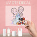 Charming UV DTF decal of Mickey and Minnie in front of the castle, perfect for Disney lovers.