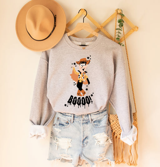 Fun Toy Story sweatshirt featuring Woody in Halloween theme.