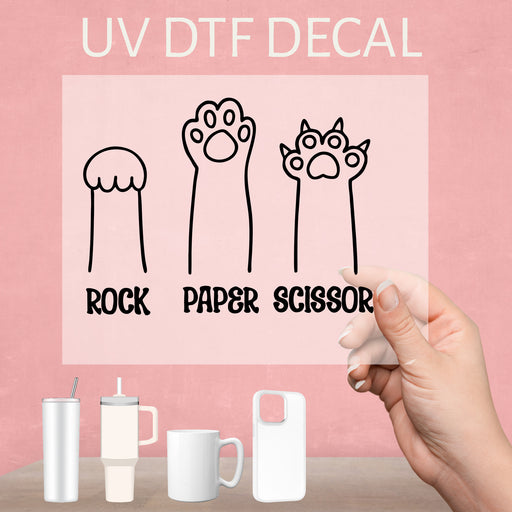 Funny Cat Rock Paper Scissors UV DTF decal, a playful design that adds humor to collection.