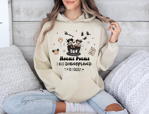 Join the Halloween magic with our Hocus Pocus hoodie featuring Minnie and Mickey.