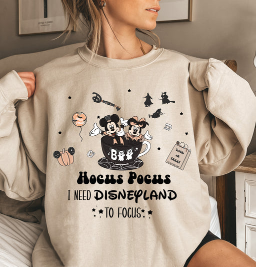 Magical Disneyland sweatshirt featuring Minnie and Mickey with a Hocus Pocus theme.