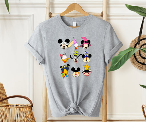 Festive Disney shirt featuring Mickey and friends in Halloween costumes.