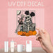 Spooky UV DTF decal of Halloween Mickey as a skeleton enjoying coffee, perfect for Halloween festivities.