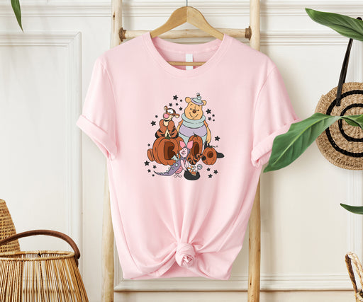 Adorable Halloween shirt featuring Winnie the Pooh with a playful 'Boo' design.