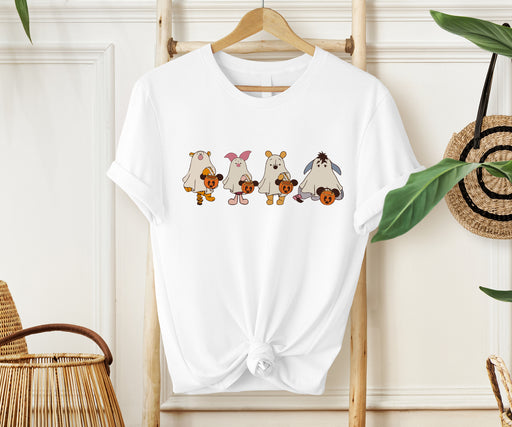 Charming Halloween shirt featuring Winnie the Pooh with friendly ghost designs.