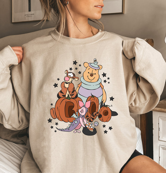 Cute sweatshirt featuring Winnie the Pooh with a 'Boo' design.