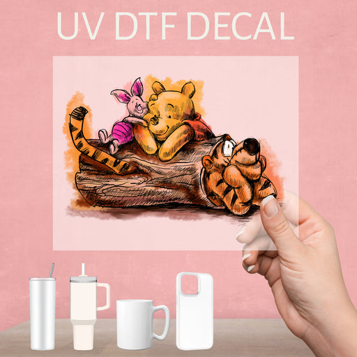 Adorable UV DTF decal featuring Winnie the Pooh, Tigger, and Piglet, perfect for fans of the classic trio.